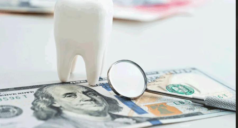 tooth on top of money