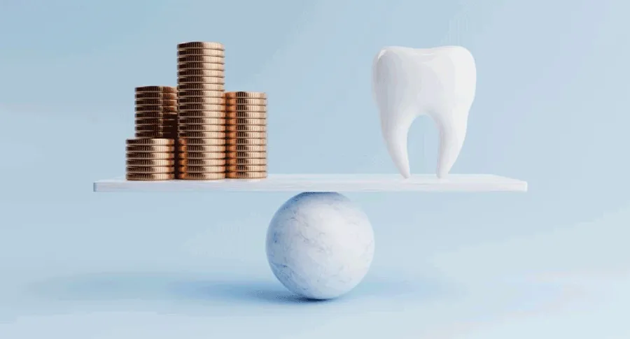 tooth balancing on money