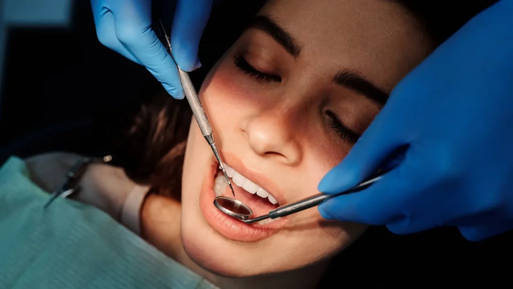 Woman getting Teeth Examination