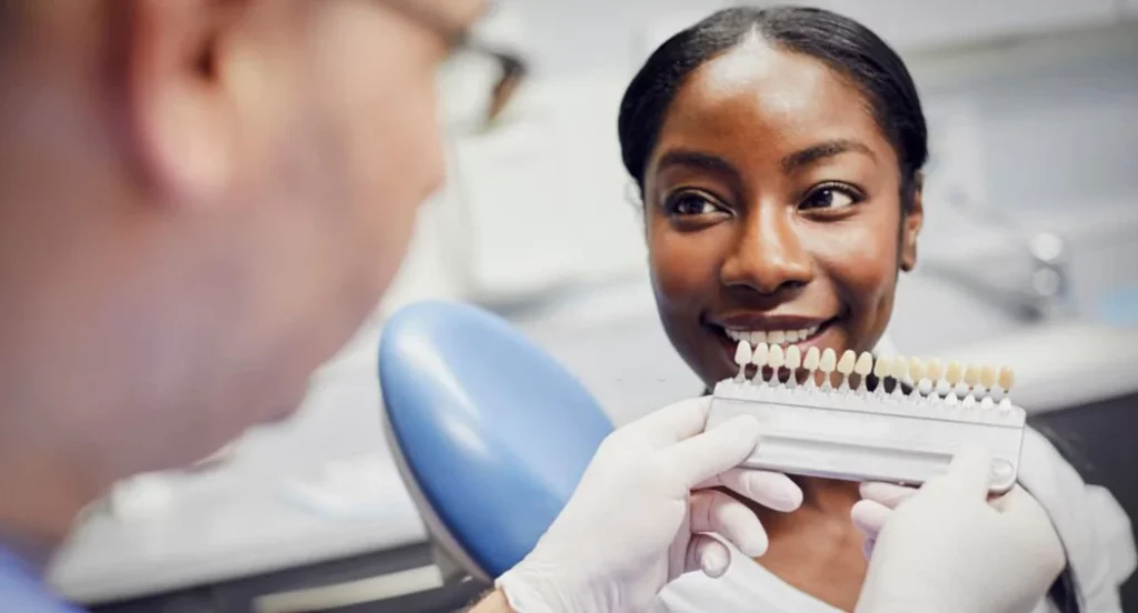 woman getting her dental veneers sampled at the dentist